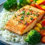 Close-up of a salmon and rice dinner with bright natural lighting