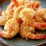 Close-up of air fryer shrimp with a golden crispy texture, perfect for quick cooking.