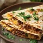 Close-up of a high protein ground beef quesadilla with melted cheese