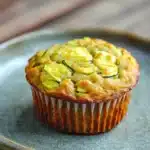 Close-up of paleo banana zucchini muffin with a clean background
