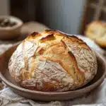 Close-up of rustic no knead bread with a golden crust made with active dry yeast
