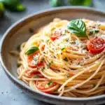 Close-up of a creamy pasta dish with herbs and sauce, perfect for a one pot meal.